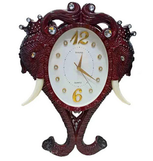 ELEPHANT SHAPED RICH WALL CLOCK ()